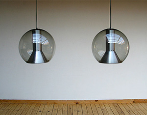 Pair of glass globe Raak lamps 1970