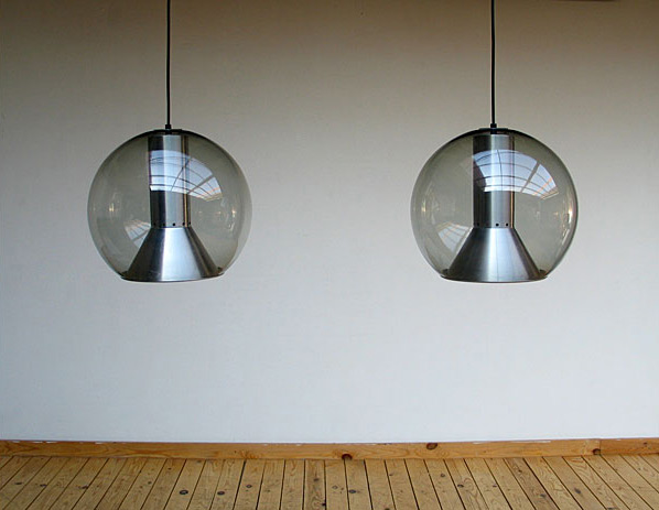 Pair of glass globe Raak lamps 1970